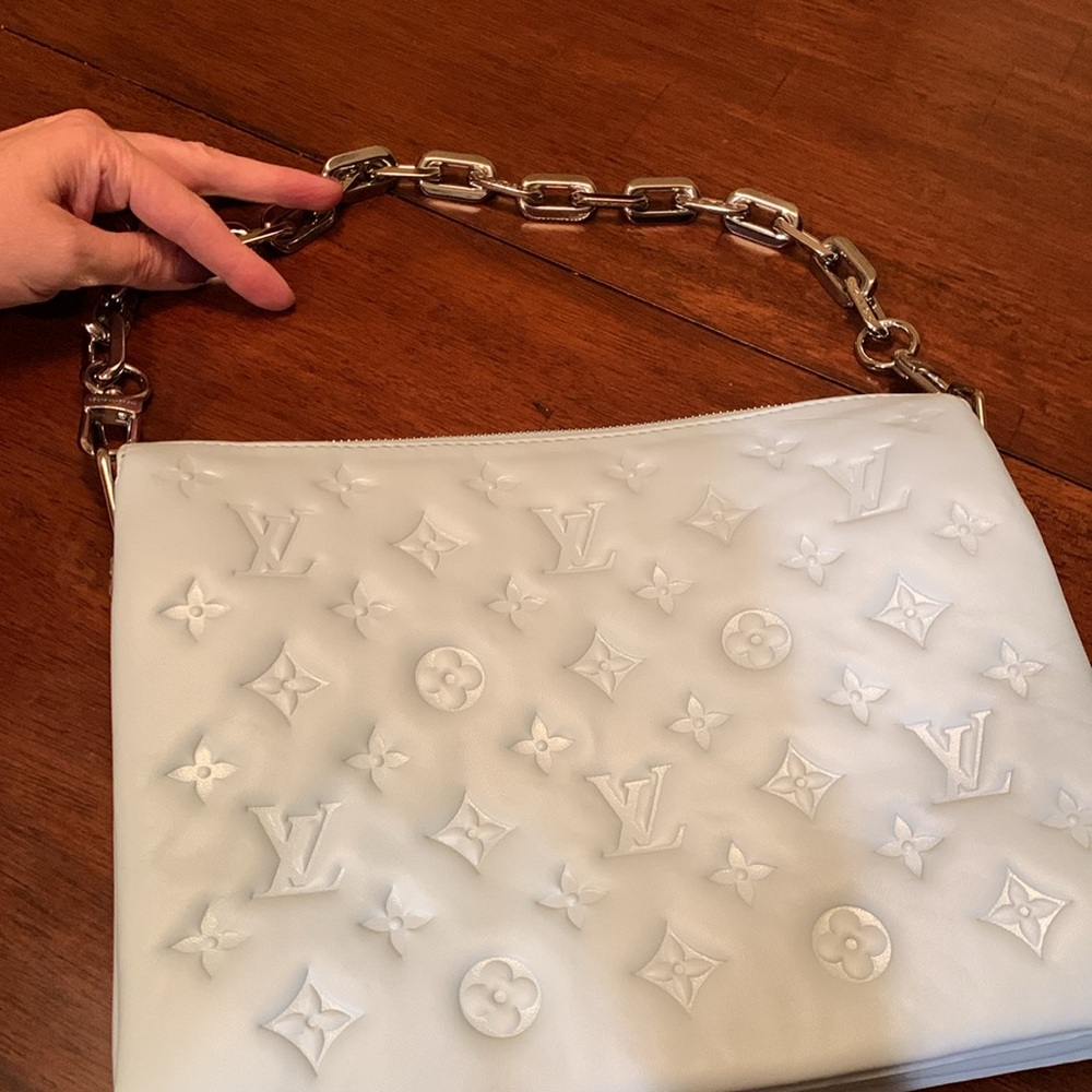 Authentic Brand new Louis Vuitton baby blue color Embossed Leather Chain purse.